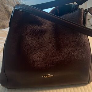 Coach  hand bag tons of space with zippered interior brown in EUC. 12” w x10”
